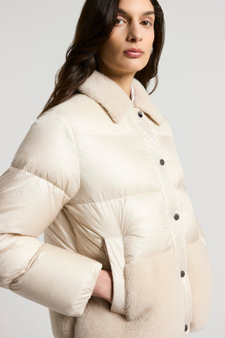 Short down jacket with shearling inserts