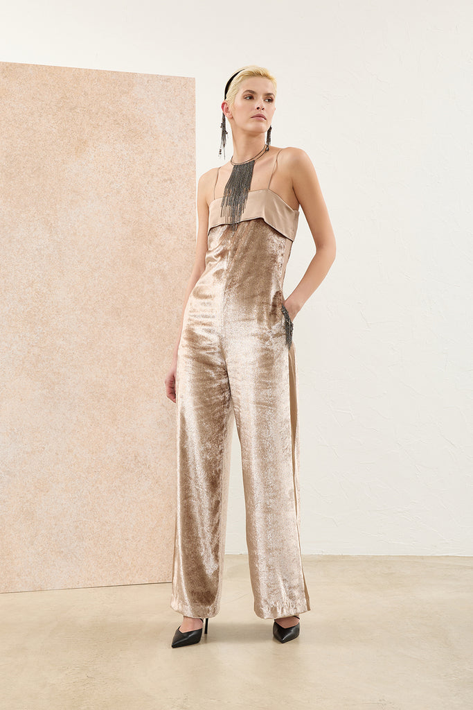 Jumpsuit in wet-look velvet  