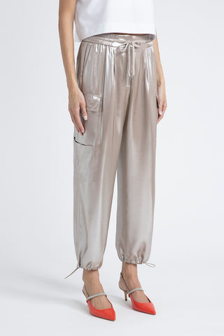 Baggy trousers in flowing silver laminated viscose twill  