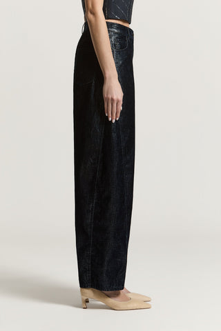 Pantalone in denim floccato glitterato