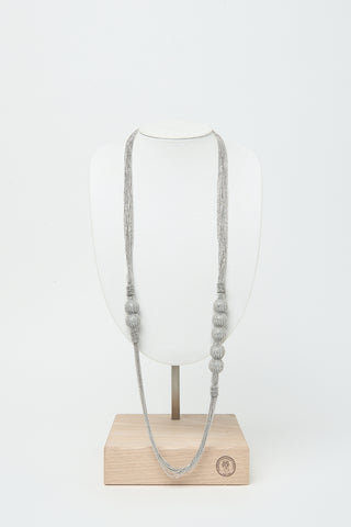 Long metal necklace with spheres