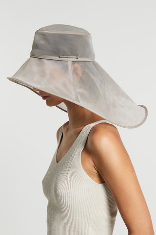 Asymmetrical semi-transparent hat