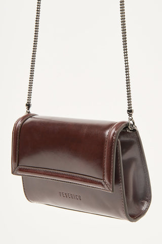 Micro pochette in pelle lucida