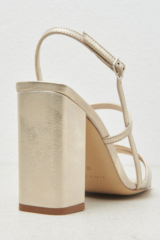 Heeled leather sandal with Punto Luce