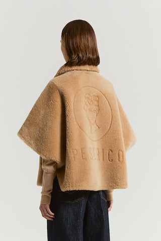 Reversible real shearling cape