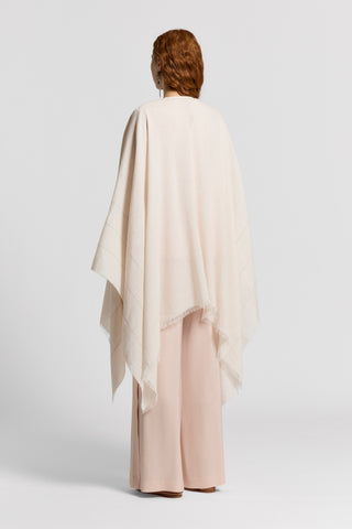 Cotton and linen poncho with Punto Luce detailing