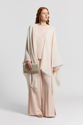 Poncho in lino e cotone con Punto Luce