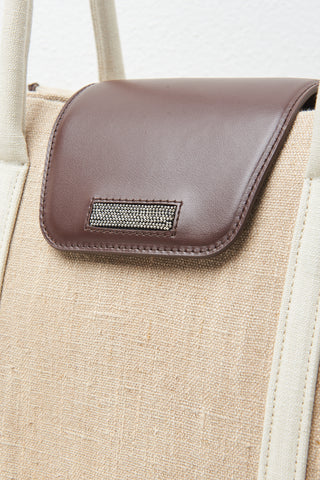 Two-tone leather and linen hand-held bag