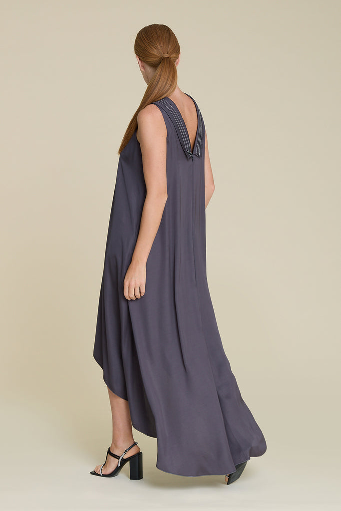 Exquisite asymmetric dress in luminous  fluid viscose satin with deep scoop back neck and diamond cut chain detail on neckline  