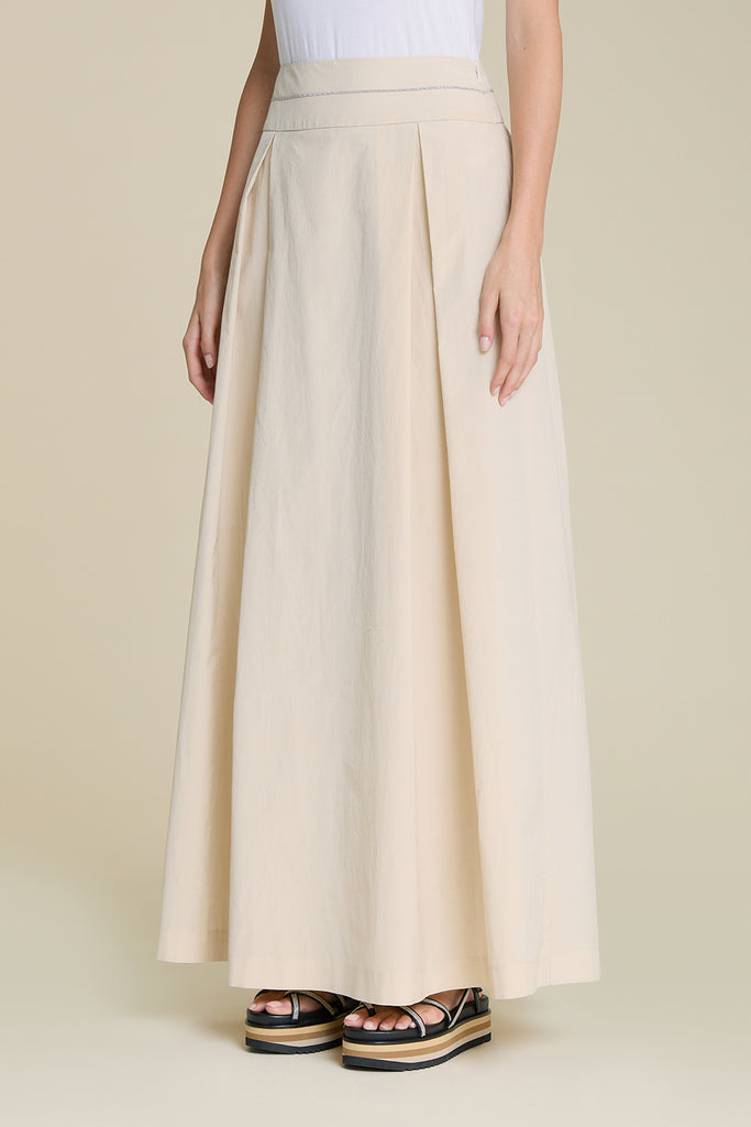 Elegant skirt in light cotton poplin with diamond chain cut detail on the basque  
