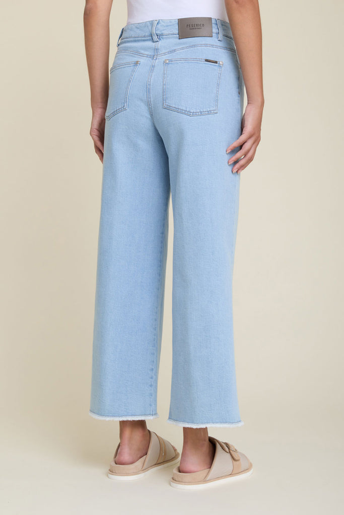 Wide jeans with frayed hems in bleach wash comfort denim  