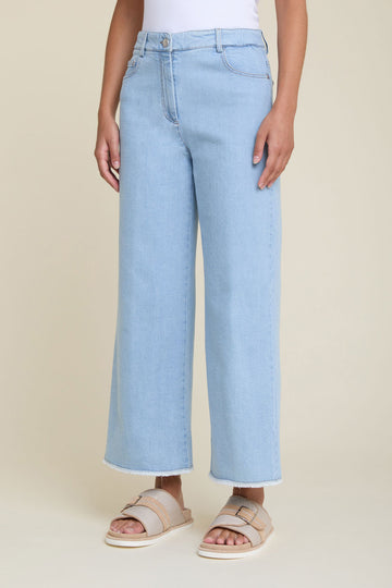 Wide jeans with frayed hems in bleach wash comfort denim  
