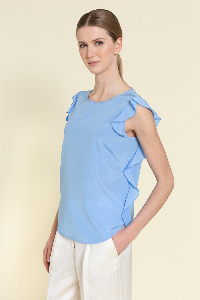 Top in silk crepe de chine with light ruches on the shoulders illuminated with diamond cut chain trim  