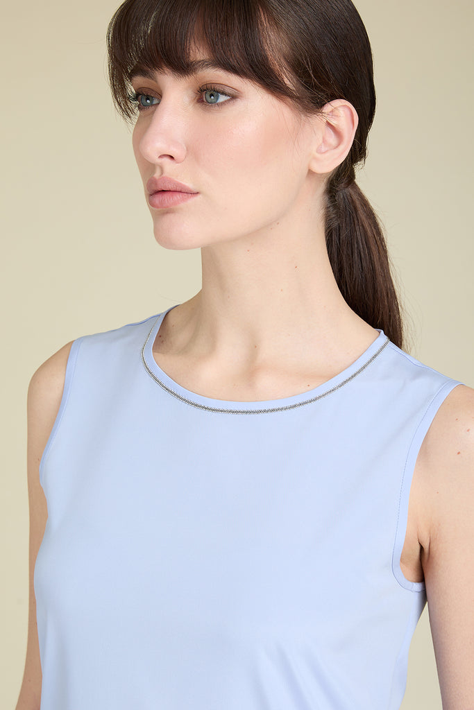 Top in comfort silk crepe de chine with diamond cut chain trim around neckline  