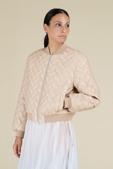 Quilted bomber jacket in luminous glass-effect ripstop with knitted details  