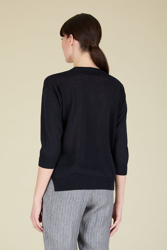 Relaxed plain knit sweater in cool linen cotton crŠpe yarn with diamond cut chain trim on pocket  